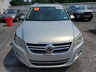 2011 Volkswagen Tiguan SEL z VIN WVGBV7AX4BW534922, wystawiony jako Copart lot #60486775 z przebiegiem Nie podano mil oraz Czysty tytuł • Clean title. Historia ofert i sprzedaży dostępna na DreamBid. Obrazek 5.