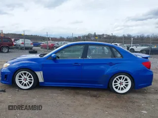 2012 Subaru WRX WRX z VIN JF1GV7E65CG017853, wystawiony jako IAAI lot #41915526 z przebiegiem 93 268 mil mil oraz . Historia ofert i sprzedaży dostępna na DreamBid. Obrazek 14.