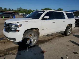 2015 Chevrolet Suburban LT with VIN 1GNSCJKC6FR302045, listed as a Copart auction lot 51764815 with 198,862 mi miles and Salvage title. Bid and sale history available at DreamBid. Image 1.