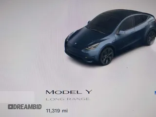 2025 Tesla Model Y Long Range with VIN 7SAYGDED2SF228414, listed as a IAAI auction lot 41706470 with 11,319 mi miles and . Bid and sale history available at DreamBid. Image 7.