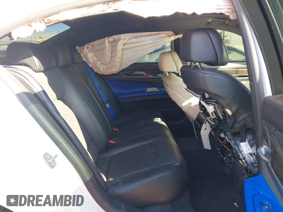 2014 BMW 7 Series 750i с VIN WBAYA8C58ED228444, выставлен на аукционе IAAI как лот 41665037 с пробегом 165 663 миль миль и . История ставок и продаж доступна на DreamBid. Изображение 8.
