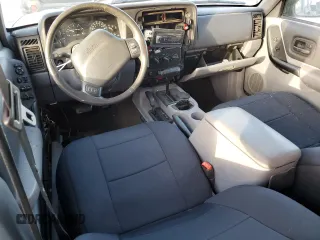 1998 Jeep Cherokee Country with VIN 1J4FT78S8XL520854, listed as a Copart auction lot 79304214 with 111,674 mi miles and Clean title. Bid and sale history available at DreamBid. Image 8.