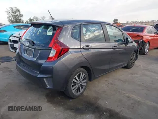 2015 Honda Fit LX with VIN 3HGGK5H5XFM719477, listed as a IAAI auction lot 41671194 with 145,876 mi miles. Bid and sale history available at carsss.com. Image 4.