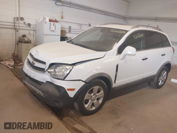 2014 Chevrolet Captiva Sport LS with VIN 3GNAL2EK9ES648395, listed as a IAAI auction lot 42261664 with 128,360 mi miles and . Bid and sale history available at DreamBid. Image 2.