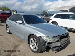 2014 BMW 3 Series 328i with VIN WBA3C1C50EK106412, listed as a IAAI auction lot 41934487 with 168,170 mi miles and . Bid and sale history available at DreamBid. Image 1.