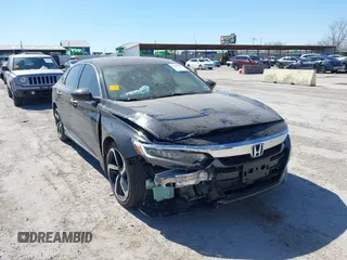 2019 Honda Accord Touring z VIN 1HGCV2F96KA034782, wystawiony jako IAAI lot #41851888 z przebiegiem 99 344 mil mil oraz . Historia ofert i sprzedaży dostępna na DreamBid. Obrazek 6.