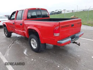 2000 Dodge Dakota Sport with VIN 1B7GG2ANXYS621732, listed as a IAAI auction lot 41930673 with 145,653 mi miles and . Bid and sale history available at carsss.com. Image 3.