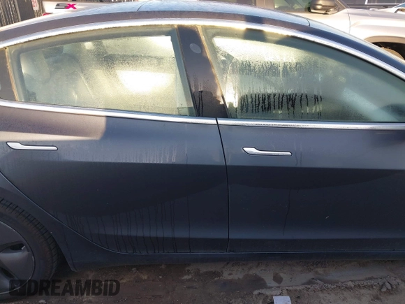2018 Tesla Model 3 Long Range Battery with VIN 5YJ3E1EB0JF170215, listed as a IAAI auction lot 41969004 with 81,704 mi miles and . Bid and sale history available at DreamBid. Image 12.