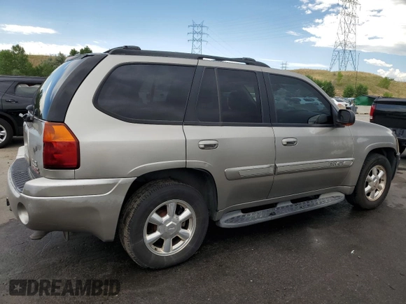2003 GMC Envoy SLT with VIN 1GKDT13SX32281667, listed as a Copart auction lot 66211344 with 228,312 mi miles and Clean Title. Bid and sale history available at carsss.com. Image 3.