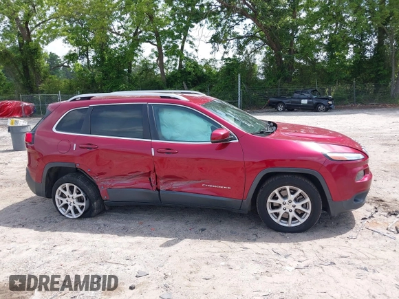 2016 Jeep Cherokee Latitude with VIN 1C4PJLCB8GW320099, listed as a IAAI auction lot 42236076 with 186,000 mi miles and . Bid and sale history available at DreamBid. Image 13.