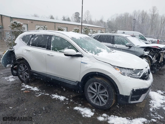 2022 Honda CR-V Hybrid Touring with VIN 5J6RT6H96NL055556, listed as a IAAI auction lot 41555001 with 52,870 mi miles. Bid and sale history available at carsss.com. Image 1.