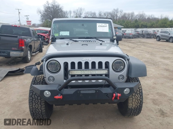 2015 Jeep Wrangler Unlimited Rubicon with VIN 1C4BJWFG1FL546018, listed as a IAAI auction lot 42060045 with 107,249 mi miles and . Bid and sale history available at DreamBid. Image 13.