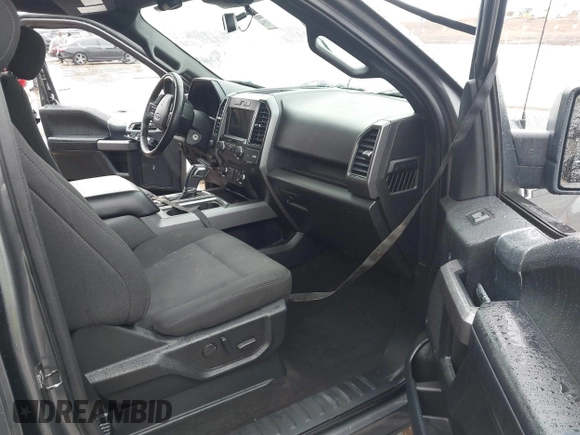 2019 Ford F-150 XL with VIN 1FTEW1C56KKC31025, listed as a IAAI auction lot 41452618 with 153,422 mi miles and . Bid and sale history available at DreamBid. Image 5.
