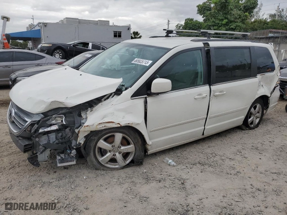 2011 Volkswagen Routan SE with VIN 2V4RW3DG5BR766741, listed as a Copart auction lot 80923713 with 169,703 mi miles and Salvage Title. Bid and sale history available at carsss.com. Image 1.