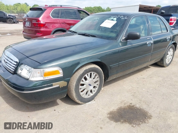 2003 Ford Crown Victoria LX z VIN 2FAFP74WX3X184730, wystawiony jako IAAI lot #42264132 z przebiegiem 297 561 mil mil oraz . Historia ofert i sprzedaży dostępna na DreamBid. Obrazek 2.