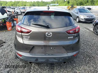2017 Mazda CX-3 Touring z VIN JM1DKDC71H0172044, wystawiony jako Copart lot #56465125 z przebiegiem 119 374 mil mil oraz Szkoda całkowita • Salvage title. Historia ofert i sprzedaży dostępna na DreamBid. Obrazek 6.