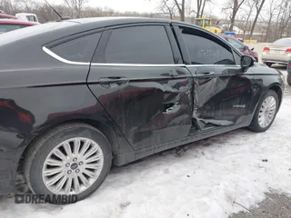 2014 Ford Fusion SE Hybrid with VIN 3FA6P0LUXER236740, listed as a IAAI auction lot 41399510 with 82,720 mi miles. Bid and sale history available at carsss.com. Image 6.
