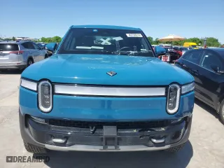 2022 Rivian R1T Adventure Package with VIN 7FCTGAAA4NN016700, listed as a Copart auction lot 49730914 with 33,339 mi miles and Clean Title. Bid and sale history available at carsss.com. Image 5.