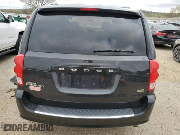 2012 Dodge Grand Caravan SXT with VIN 2C4RDGCG5CR253449, listed as a Copart auction lot 54592975 with 86,200 mi miles and Non Repairable. Bid and sale history available at DreamBid. Image 6.