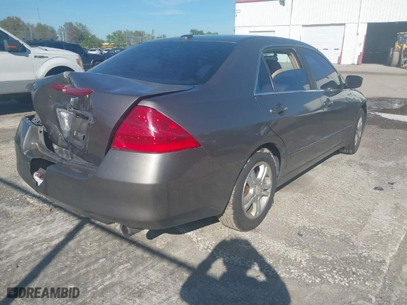 2007 Honda Accord Sdn EX-L with VIN 1HGCM568X7A143829, listed as a IAAI auction lot 41757660 with 235,502 mi miles. Bid and sale history available at carsss.com. Image 4.