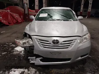 2009 Toyota Camry z VIN 4T1BE46KX9U352465, wystawiony jako IAAI lot #41518299 z przebiegiem 107 348 mil mil oraz . Historia ofert i sprzedaży dostępna na DreamBid. Obrazek 12.