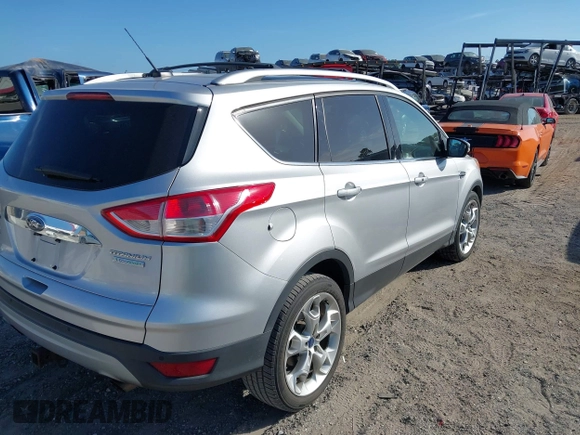 2016 Ford Escape Titanium with VIN 1FMCU0J94GUB11776, listed as a IAAI auction lot 41945655 with 119,949 mi miles. Bid and sale history available at carsss.com. Image 4.