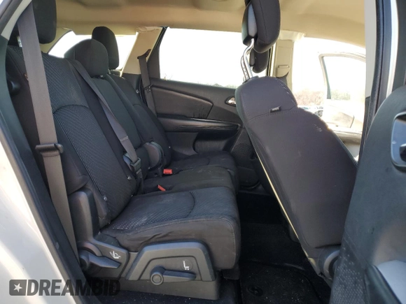2013 Dodge Journey SXT with VIN 3C4PDCBG7DT689297, listed as a Copart auction lot 47303385 with 129,120 mi miles and Salvage Title. Bid and sale history available at carsss.com. Image 12.