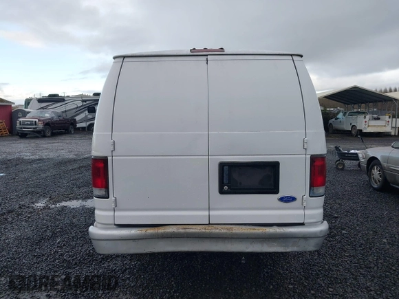 1996 Ford Econoline Cargo with VIN 1FTJS34H4THA69893, listed as a IAAI auction lot 41703257 with 206,503 mi miles and . Bid and sale history available at DreamBid. Image 16.