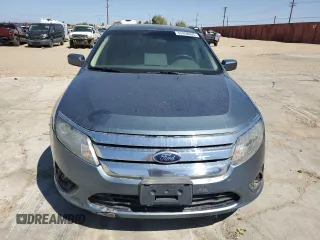 2012 Ford Fusion SE z VIN 3FAHP0HA0CR213729, wystawiony jako Copart lot #52458665 z przebiegiem 107 419 mil mil oraz Czysty tytuł • Clean title. Historia ofert i sprzedaży dostępna na DreamBid. Obrazek 5.