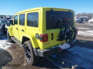 2023 Jeep Wrangler 4xe Sahara with VIN 1C4JJXP66PW580527, listed as a IAAI auction lot 41261127 with 15,100 mi miles. Bid and sale history available at carsss.com. Image 3.