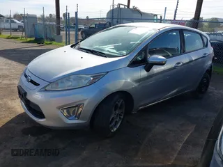 2011 Ford Fiesta SES with VIN 3FADP4FJ1BM149138, listed as a IAAI auction lot 41612288 with 131,798 mi miles. Bid and sale history available at carsss.com. Image 17.