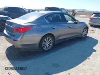 2015 Infiniti Q50 Premium z VIN JN1BV7AR9FM408386, wystawiony jako IAAI lot #42084887 z przebiegiem 122 527 mil mil oraz . Historia ofert i sprzedaży dostępna na DreamBid. Obrazek 4.
