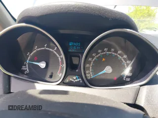 2015 Ford Fiesta SE with VIN 3FADP4BJ6FM160227, listed as a IAAI auction lot 42239191 with 131,614 mi miles and . Bid and sale history available at DreamBid. Image 7.