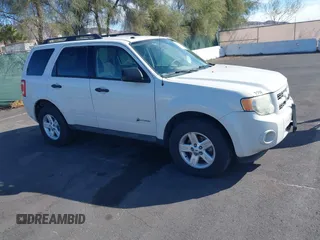 2009 Ford Escape Hybrid with VIN 1FMCU49349KA19086, listed as a IAAI auction lot 41704934 with 91,047 mi miles. Bid and sale history available at carsss.com. Image 1.