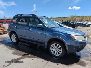 2011 Subaru Forester X Limited with VIN JF2SHAEC7BH739950, listed as a Copart auction lot 54569515 with 115,238 mi miles and Salvage title. Bid and sale history available at DreamBid. Image 4.