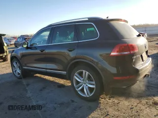 2012 Volkswagen Touareg Sport z VIN WVGEF9BP9CD006844, wystawiony jako Copart lot #43216485 z przebiegiem 120 059 mil mil oraz Szkoda całkowita • Salvage title. Historia ofert i sprzedaży dostępna na DreamBid. Obrazek 2.