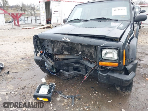 1999 Jeep Cherokee Sport with VIN 1J4FT68S6XL598558, listed as a IAAI auction lot 41549504 with 238,004 mi miles. Bid and sale history available at carsss.com. Image 6.