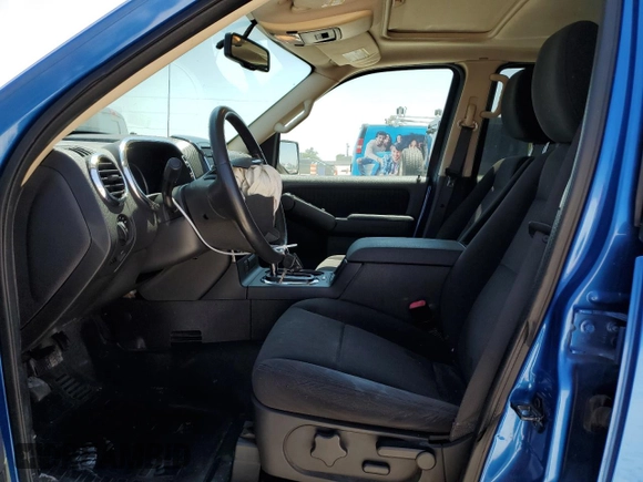 2010 Ford Explorer Sport Trac XLT z VIN 1FMEU3BE4AUF04190, wystawiony jako Copart lot #51857205 z przebiegiem 91 112 mil mil oraz Szkody całkowita. Historia ofert i sprzedaży dostępna na DreamBid. Obrazek 7.