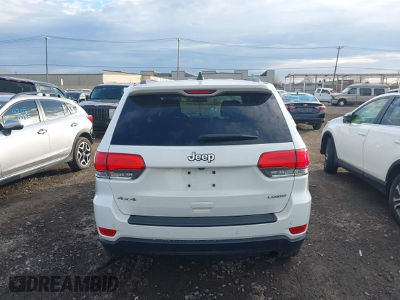 2018 Jeep Grand Cherokee Laredo E with VIN 1C4RJFAG6JC406061, listed as a IAAI auction lot 42046977 with 90,339 mi miles and . Bid and sale history available at DreamBid. Image 16.
