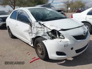 2012 Toyota Yaris with VIN JTDBT4K31CL027631, listed as a IAAI auction lot 41799191 with Not Provided miles and . Bid and sale history available at DreamBid. Image 6.