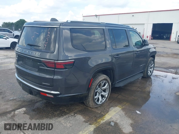 2023 Jeep Wagoneer Series II with VIN 1C4SJVBPXPS515874, listed as a IAAI auction lot 42728894 with 56,284 mi miles and . Bid and sale history available at DreamBid. Image 4.