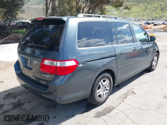 2005 Honda Odyssey EX-L with VIN 5FNRL38725B084980, listed as a IAAI auction lot 41917012 with 134,685 mi miles. Bid and sale history available at carsss.com. Image 4.