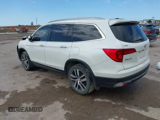 2017 Honda Pilot Touring with VIN 5FNYF6H9XHB034001, listed as a IAAI auction lot 42092549 with 142,422 mi miles and . Bid and sale history available at DreamBid. Image 3.