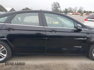 2016 Ford Fusion SE Hybrid with VIN 3FA6P0LU5GR356433, listed as a IAAI auction lot 41799204 with 157,670 mi miles. Bid and sale history available at carsss.com. Image 13.