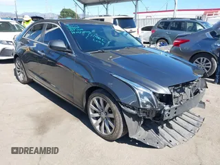 2018 Cadillac ATS RWD z VIN 1G6AA5RXXJ0146893, wystawiony jako IAAI lot #41702927 z przebiegiem 85 522 mil mil oraz . Historia ofert i sprzedaży dostępna na DreamBid. Obrazek 1.