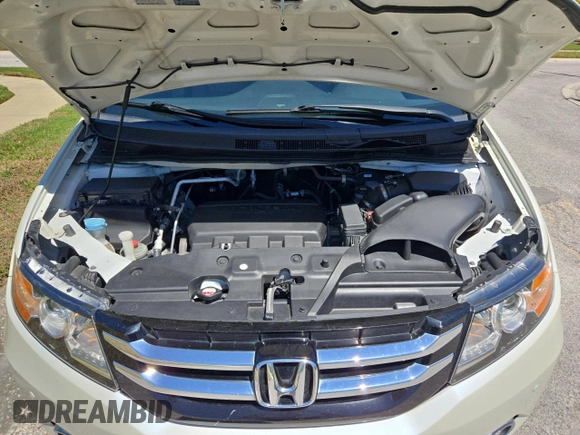 2017 Honda Odyssey Touring z VIN 5FNRL5H91HB008068, wystawiony jako Copart lot #49853805 z przebiegiem 33 521 mil mil oraz Czysty tytuł • Clean title. Historia ofert i sprzedaży dostępna na DreamBid. Obrazek 7.
