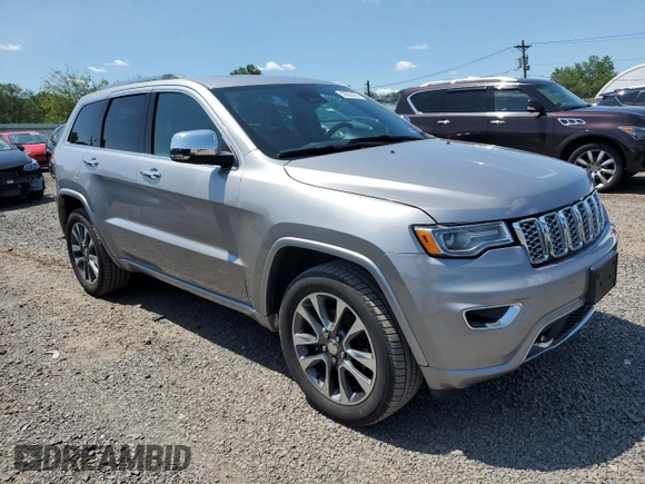 2018 Jeep Grand Cherokee Overland with VIN 1C4RJFCG2JC212947, listed as a Copart auction lot 59503405 with 76,436 mi miles and Clean title. Bid and sale history available at DreamBid. Image 4.