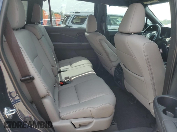 2023 Honda Passport Elite with VIN 5FNYF8H07PB036929, listed as a Copart auction lot 55981185 with 27,523 mi miles and Salvage title. Bid and sale history available at DreamBid. Image 10.