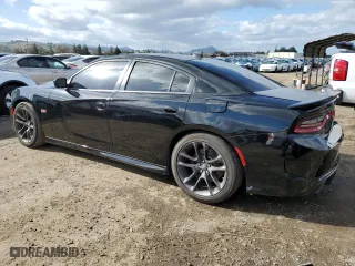2020 Dodge Charger Scat Pack with VIN 2C3CDXGJ4LH247969, listed as a Copart auction lot 45527845 with 69,817 mi miles and Salvage Title. Bid and sale history available at carsss.com. Image 2.