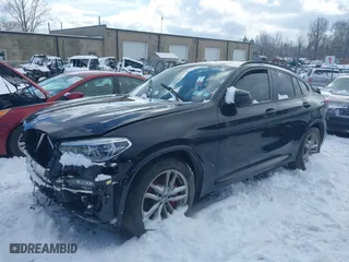 2021 BMW X4 M40i with VIN 5UX2V5C05M9H02711, listed as a IAAI auction lot 41675953 with 26,652 mi miles. Bid and sale history available at carsss.com. Image 19.